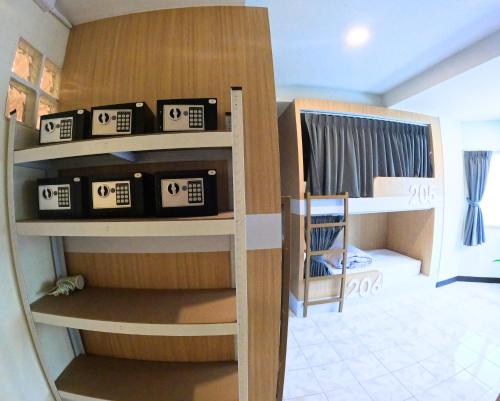 Postel nebo postele na pokoji v ubytování KPOP Hostel