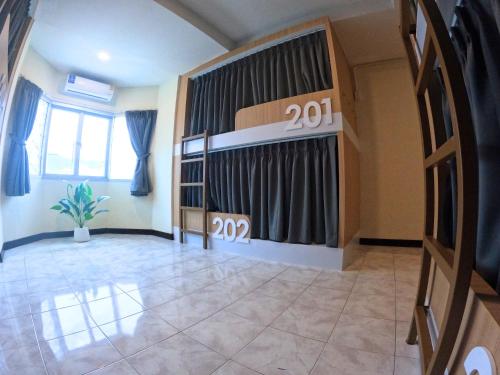 Postel nebo postele na pokoji v ubytování KPOP Hostel