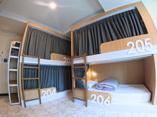 Postel nebo postele na pokoji v ubytování KPOP Hostel