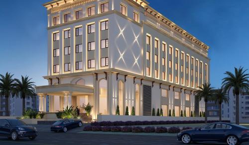 a building with cars parked in front of it at Fortune Park, Aligarh - Member ITC Hotels' Group in Alīgarh