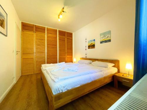 Katil atau katil-katil dalam bilik di Ferienwohnung Neptun FeWo 01 - Terrasse, Garten