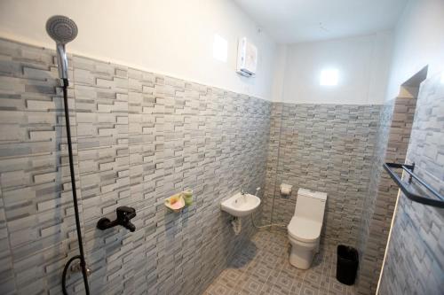 Kúpeľňa v ubytovaní Risna Homestay