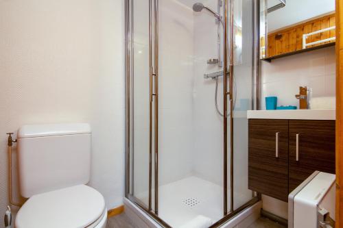 a bathroom with a shower and a toilet at Résidence Grand Roc - Campanules 114 in Chamonix
