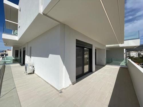 Балкон или терраса в Athenean Oasis in Ellinikon