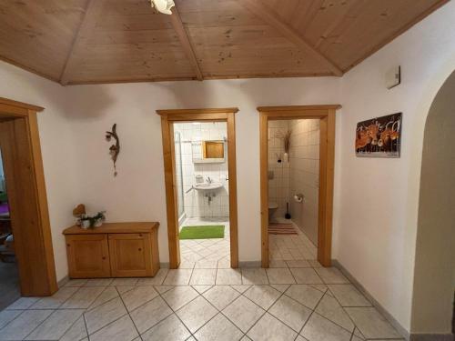 a large room with a bathroom with a toilet at Zillerbruggerhof in Bruck am Ziller