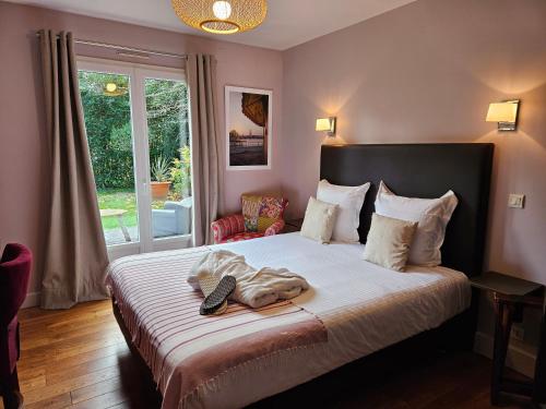 Katil atau katil-katil dalam bilik di La Fraîchette-Hôtel & Spa