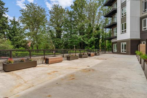 a courtyard with potted plants in a building at Kirkland 1br w wd nr groceries shopping SEA-685 in Kirkland