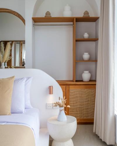 Postel nebo postele na pokoji v ubytování CODYARD SUITES