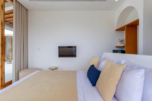 Postel nebo postele na pokoji v ubytování CODYARD SUITES