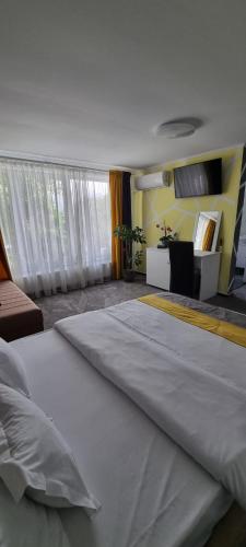 เตียงในห้องที่ CASA SONIA