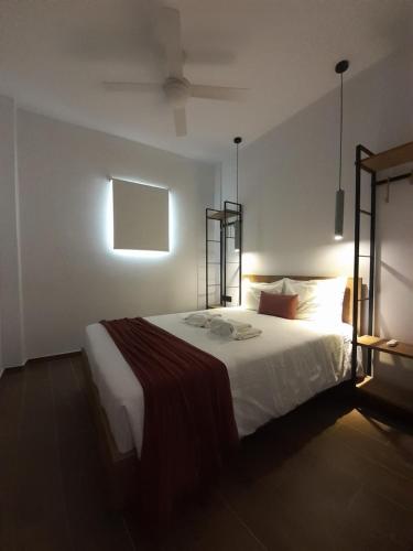 Кровать или кровати в номере Simά Apartments