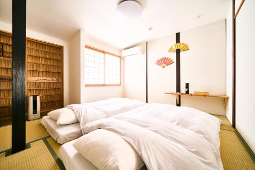 Cama o camas de una habitación en 壬生小宿