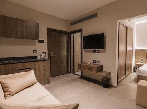 Cama o camas de una habitación en TK Suites