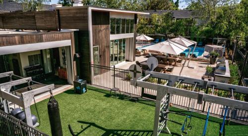 an image of a backyard with a playground at Sharon Green apartments by FantasticStay in Menlo Park