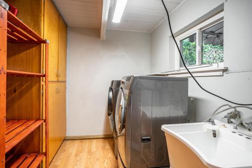 a kitchen with a refrigerator and a sink at Menlo Park 4br w garage backyard patio ac SFO-1543 in Menlo Park