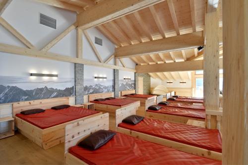 Ένα ή περισσότερα κρεβάτια σε δωμάτιο στο Chalet Zur Auszeit