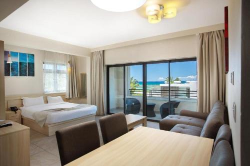 Ένα ή περισσότερα κρεβάτια σε δωμάτιο στο Residence Potosi