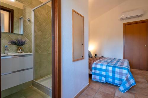 Postel nebo postele na pokoji v ubytování SARDINIA RE - Villa Gialla