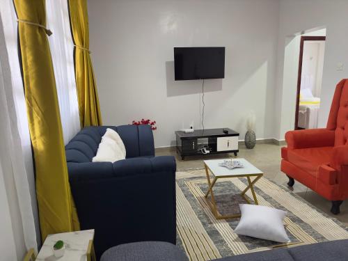 TV a/nebo společenská místnost v ubytování Serene 2 Bedrooms Apartment