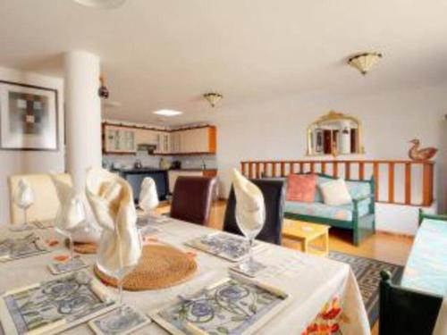 a kitchen and living room with a table and chairs at Apartment in Soo in Soo