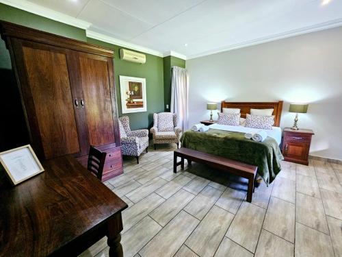 Postel nebo postele na pokoji v ubytování 2 Owls Guesthouse