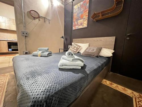 Postel nebo postele na pokoji v ubytování Urban Suite