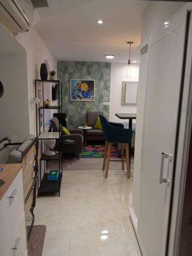 a living room with a couch and a table at Little Lion in Split