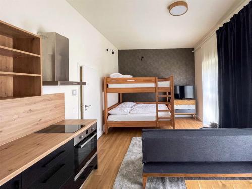 Postel nebo postele na pokoji v ubytování Apartmány Javorná