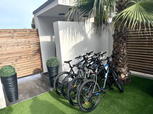 a group of bikes parked next to a building at Luxury TABOO Villa & Spa in Medulin for 8 people with heated pool- wellness & sea view in Medulin