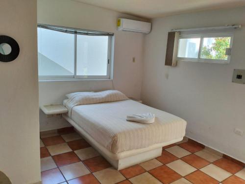 Katil atau katil-katil dalam bilik di Hotel Dos Mundos, Isla Cozumel