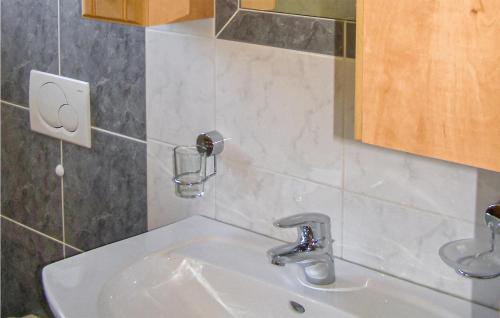a bathroom with a sink and aaucet at Nice Apartment In Trins With 2 Bedrooms And Wifi in Trins
