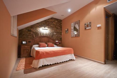 Un ou plusieurs lits dans un hébergement de l'établissement Hotel Rural Casa Paulino