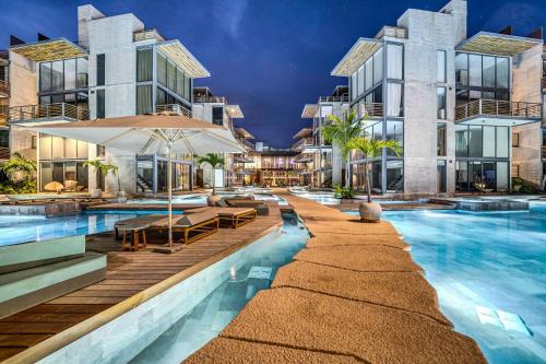 an image of a swimming pool at a hotel at Divine 1BR PH Tulum w Private Pool, Cenote, Gym in Tulum