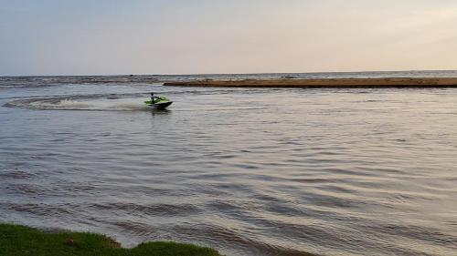 a person on a boat in the water at Villa Inlet Galle in Galle