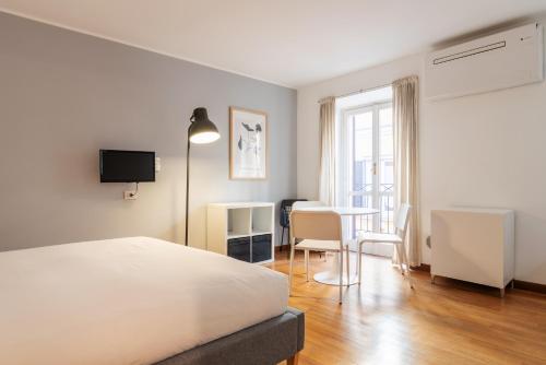 Televízia a/alebo spoločenská miestnosť v ubytovaní easyhomes - Spiga Suite