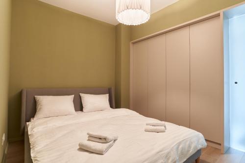 Postel nebo postele na pokoji v ubytování Alternativ 3 Residence Central