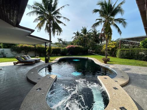 Bazén v ubytování Hua Hin Oasis nebo v jeho okolí