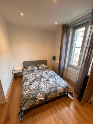 Giường trong phòng chung tại # Le 9 # Joli studio neuf, tout équipé Mulhouse centre