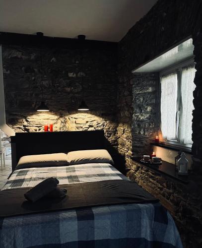 Ένα ή περισσότερα κρεβάτια σε δωμάτιο στο La casetta sul fiume