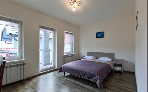 Cama o camas de una habitación en Готель Ципа