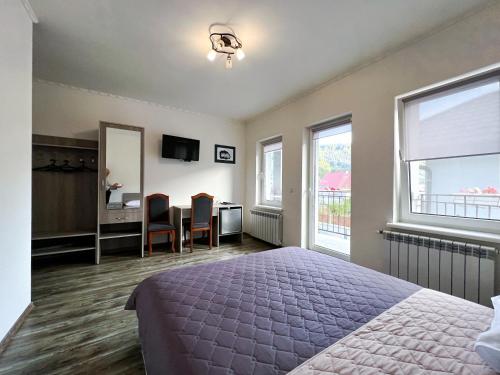 Cama o camas de una habitación en Готель Ципа