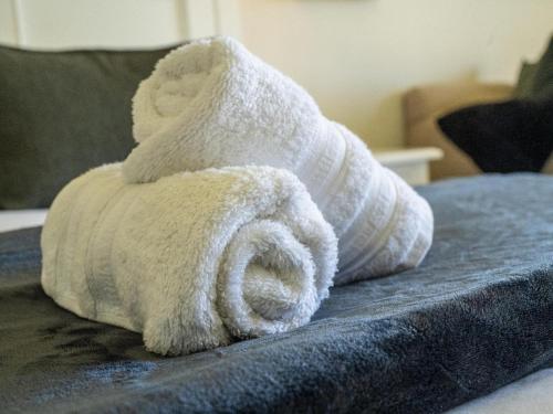 a towel animal made out of towels on a bed at Unit 261 Brookes Hill Suites in Summerstrand