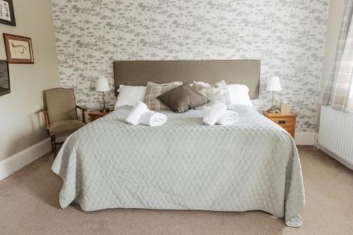 Una cama o camas en una habitación de Horton Inn