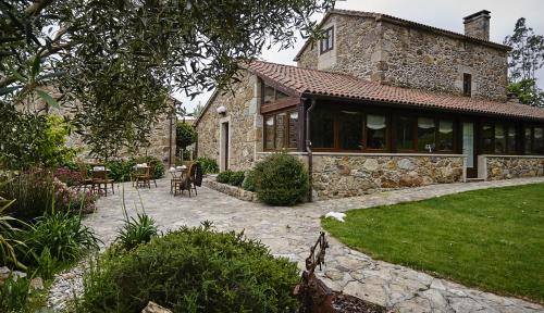 Hotel Rustico Lugar Do Cotariñoにある庭