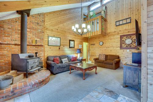 a living room with a couch and a fireplace at Pet-Friendly Boise Getaway 2 Mi to Downtown! in Boise