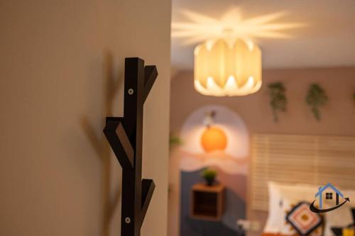 a room with a halloween pumpkin light hanging from the wall at Minchin House, nr Npton Saints Rugby, sleeps 8 in Dallington