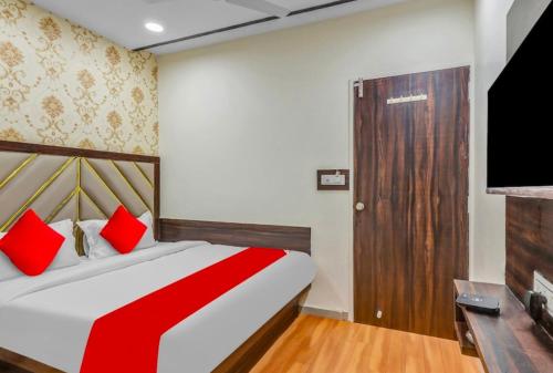 Tempat tidur dalam kamar di Hotel stay inn