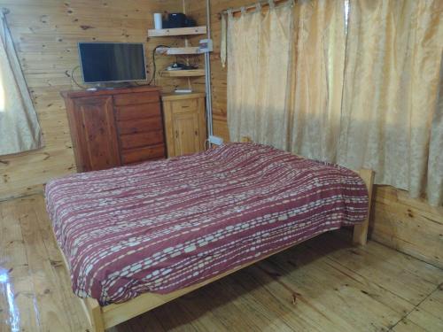 Ένα ή περισσότερα κρεβάτια σε δωμάτιο στο El Descanso