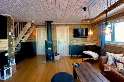 Et sittehjørne på Cozy cabin with incredible views and sauna