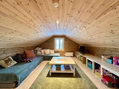 Χώρος καθιστικού στο cozy cabin with panoramic views and sauna at Blefjell